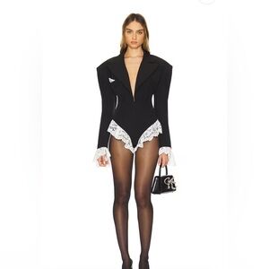 Rika Romper in Black
The Dolls House